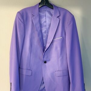 Sleek Men’s 3 piece suit. One button, solid jacket, vest, pants, and silk tie.